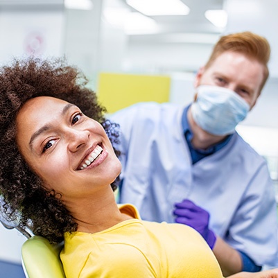 woman smiling in op chair