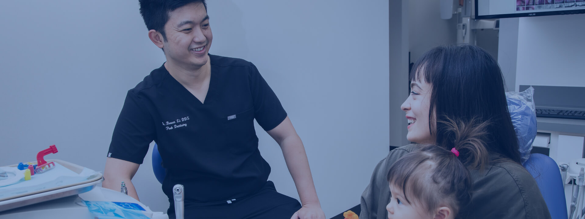 Dr. Li speaking with a patient